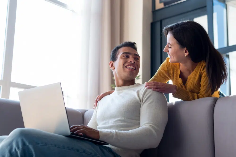 couple at computer discussing privacy policy