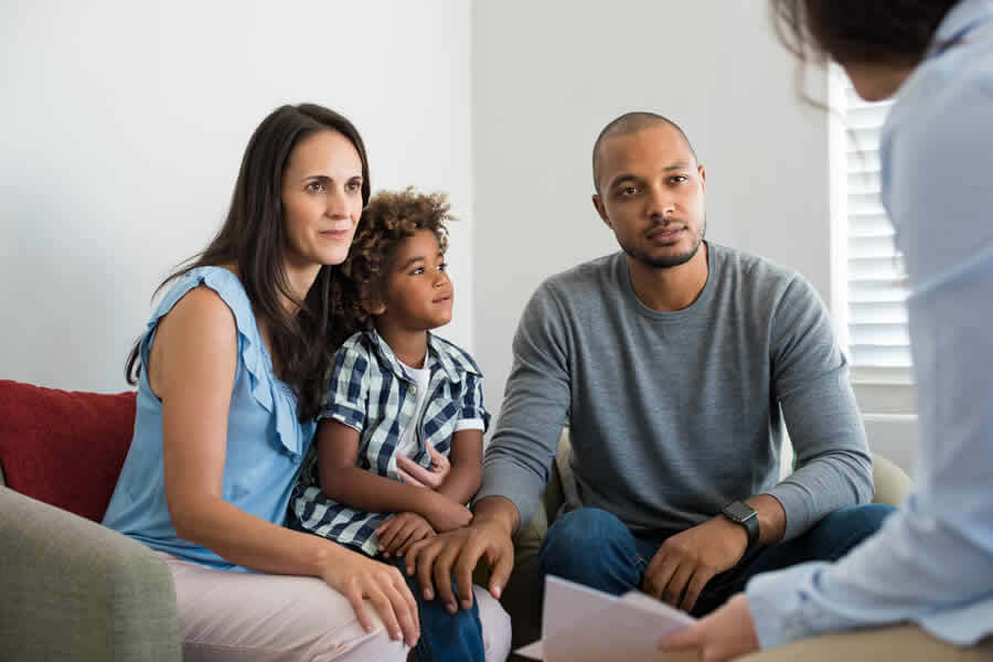 a young family receiving family counseling